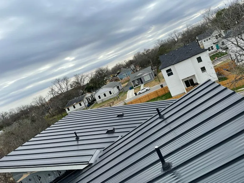 Standing seam metal roof panels with vents for Skylight Repair in Larose